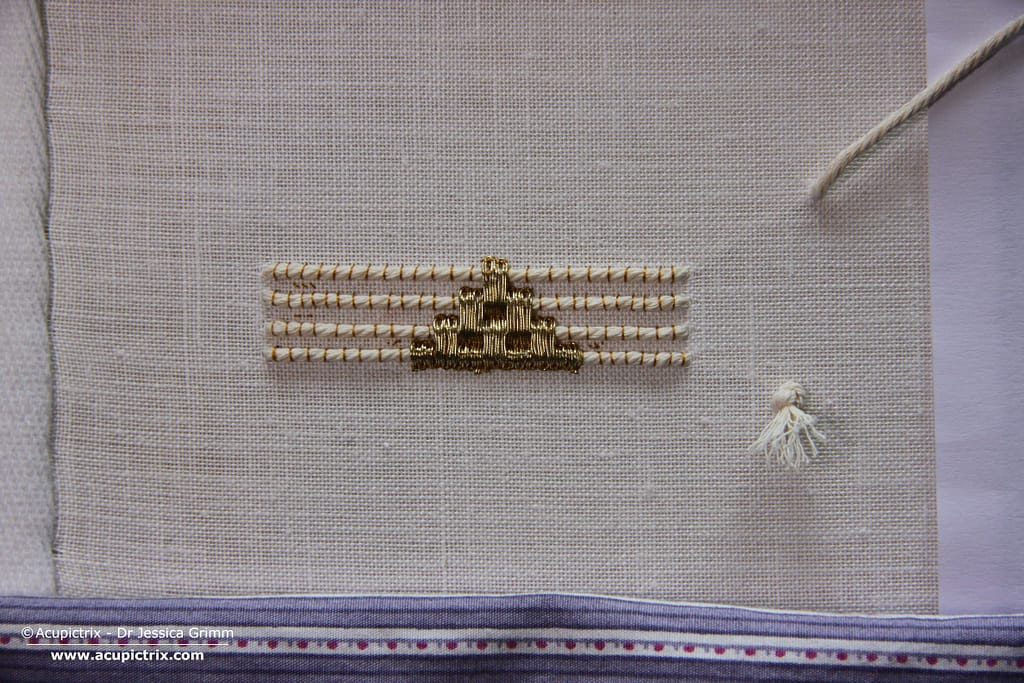 Goldwork Embroidery Tutorial - Applying gold threads over padding