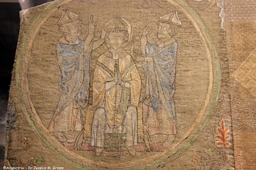 Opus anglicanum embroidery showing St Nicholas being crowned bishop.