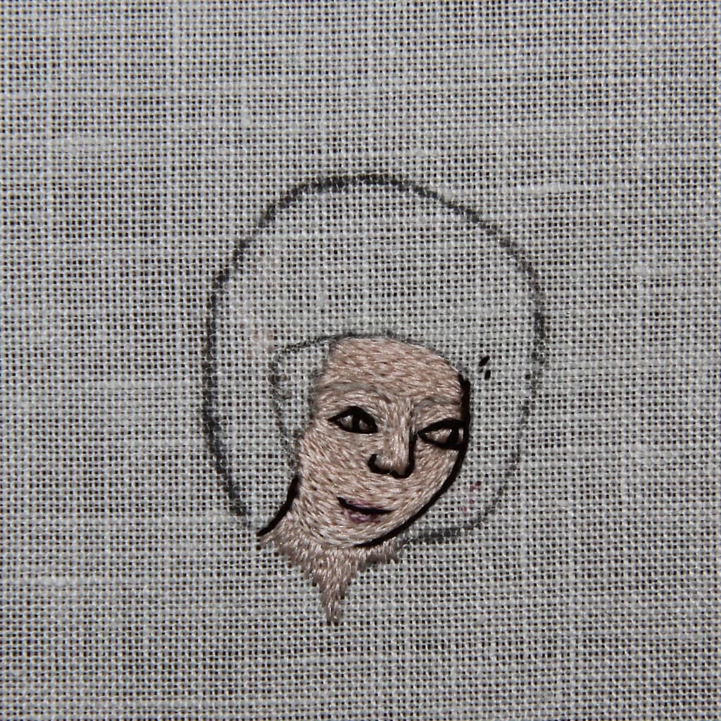 Embroidery Tutorial - partly finished sample of a female embroidered head