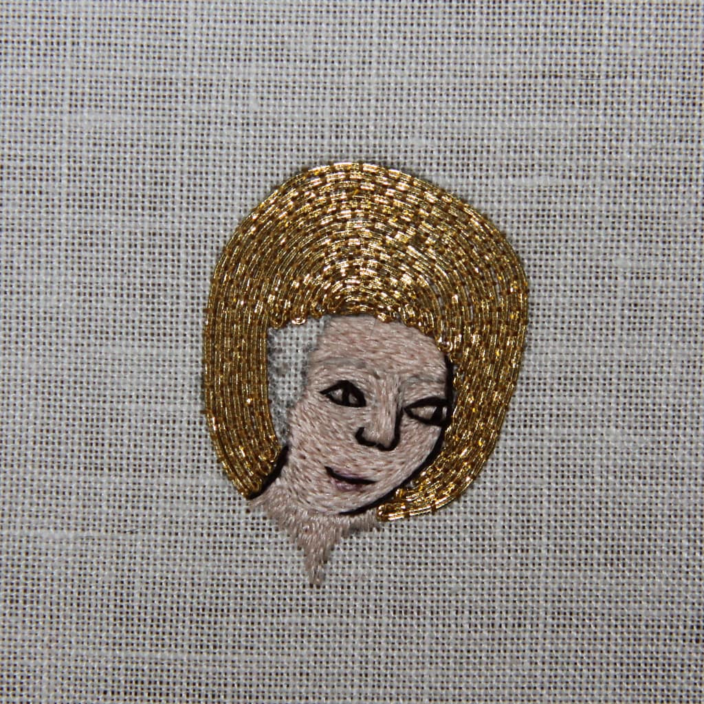 Embroidery Tutorial - partly finished sample of a female embroidered head