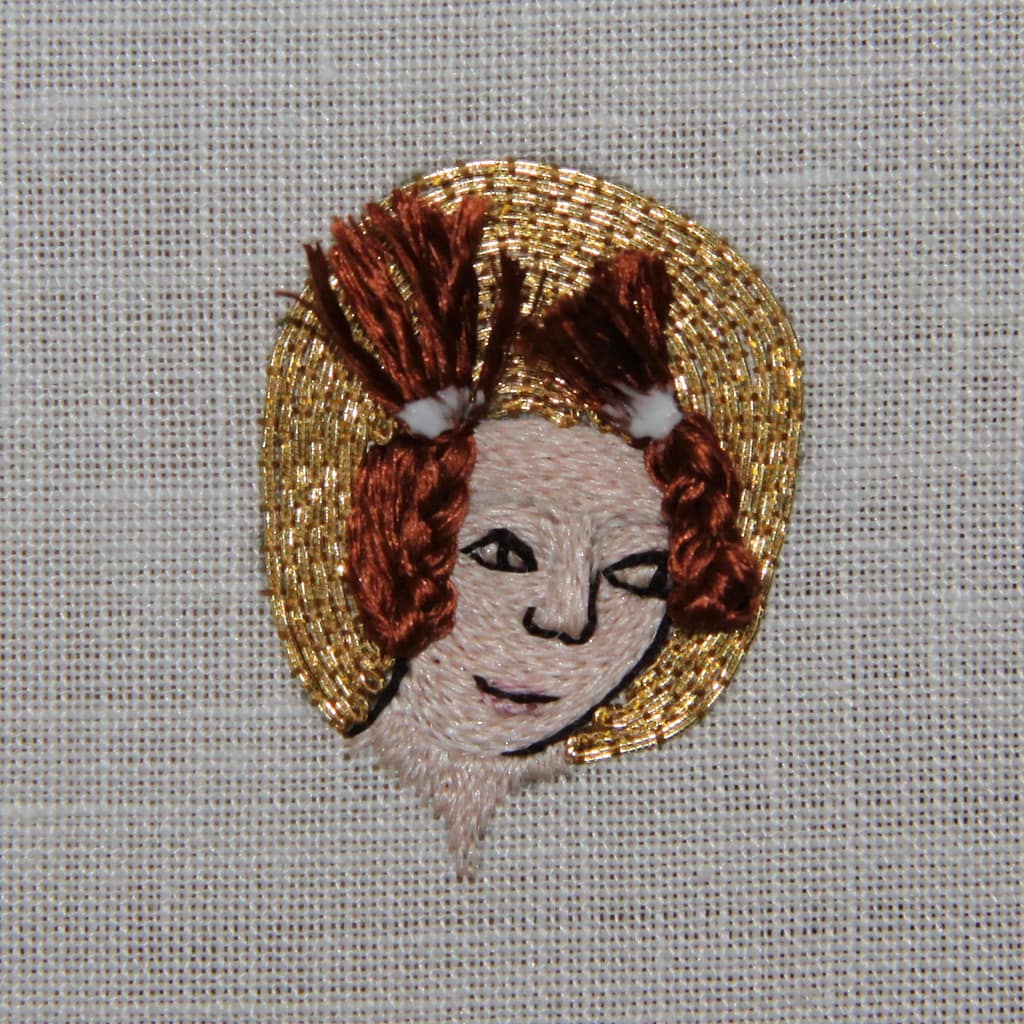 Embroidery Tutorial - partly finished sample of a female embroidered head