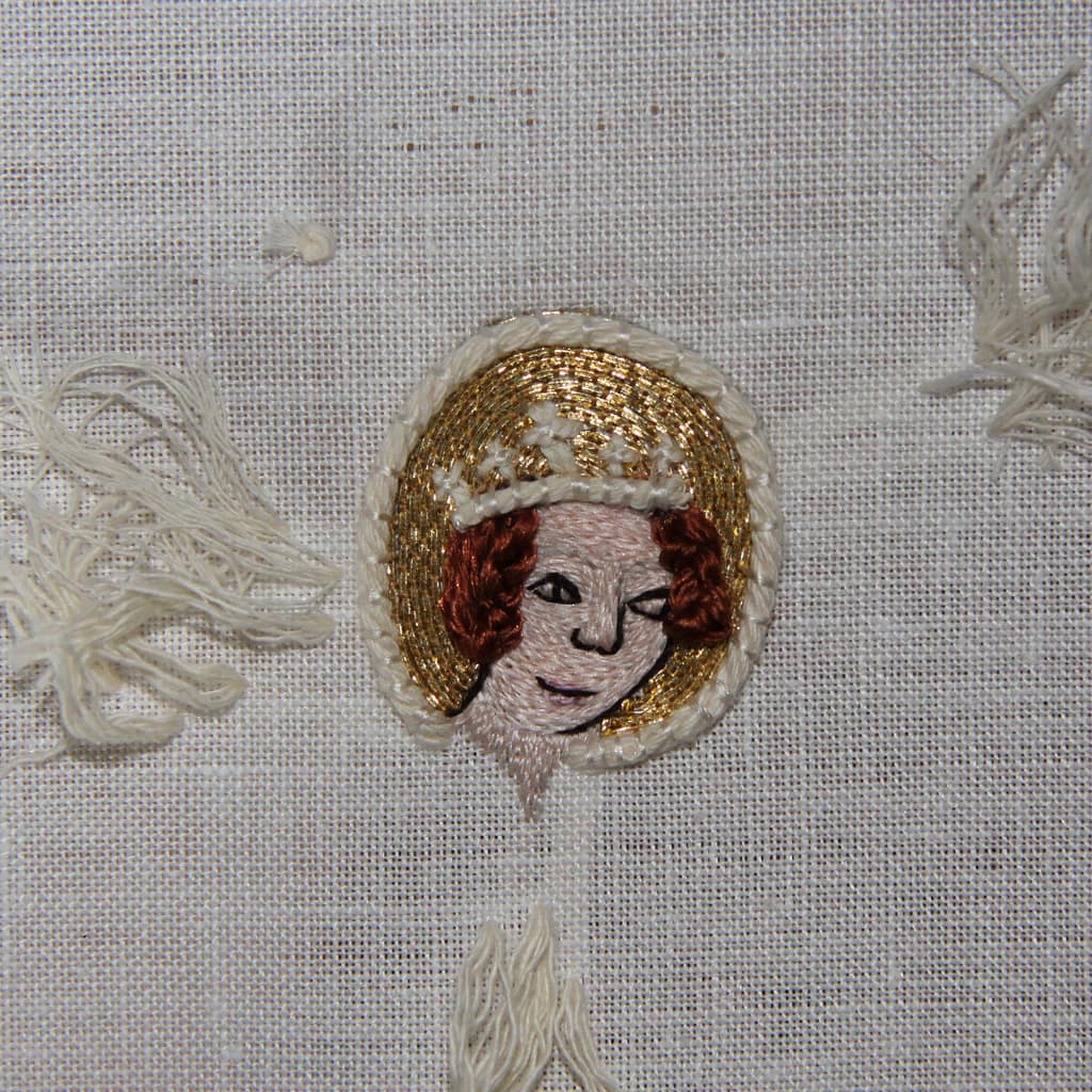Embroidery Tutorial - partly finished sample of a female embroidered head