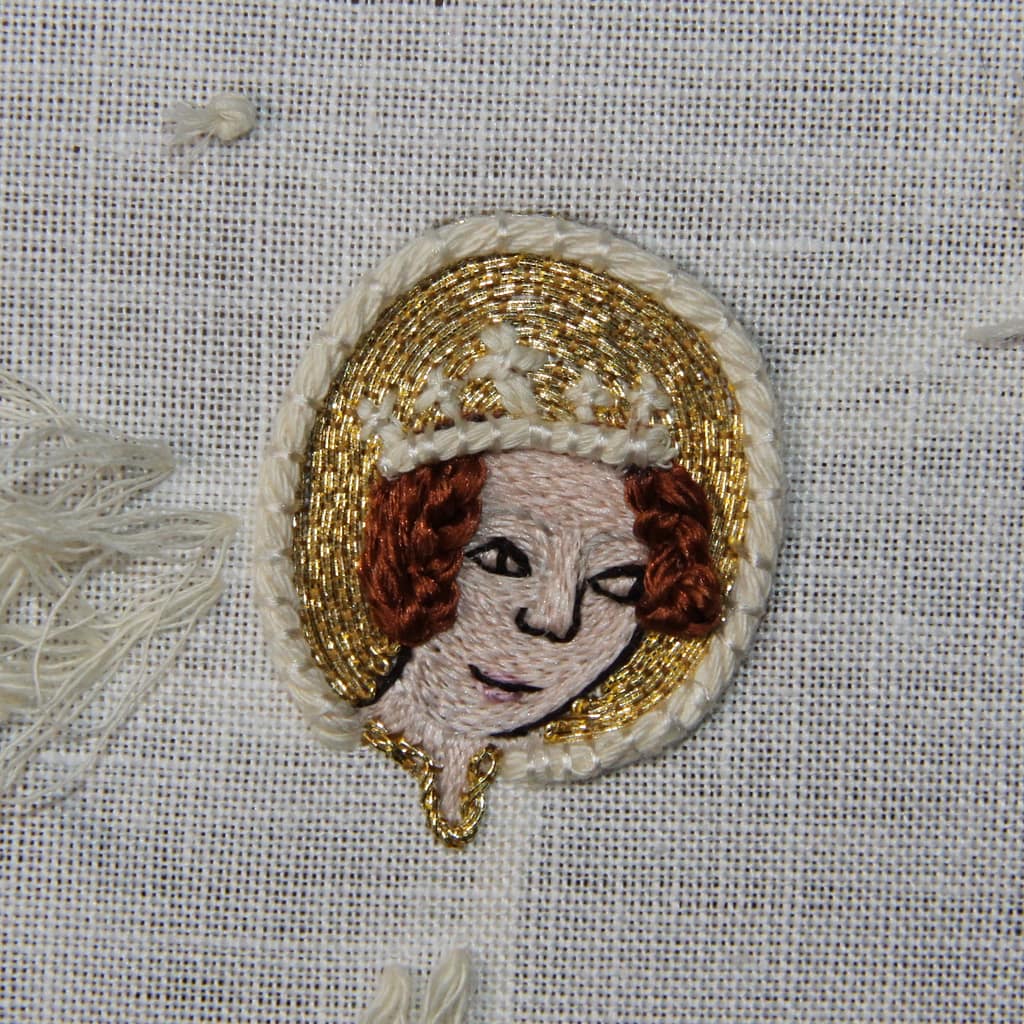 Embroidery Tutorial - partly finished sample of a female embroidered head