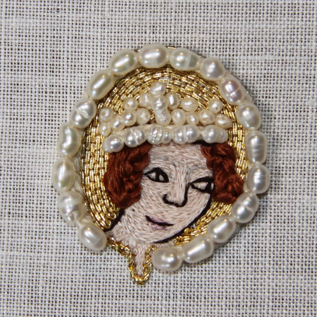 Embroidery Tutorial - partly finished sample of a female embroidered head