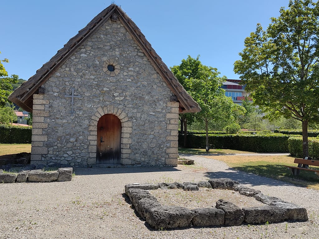 Gold threads - a church building with marked graves