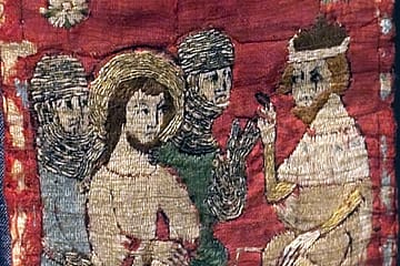 Stiftsmuseum Xanten - a red maniple embroidered with scenes of the Passion