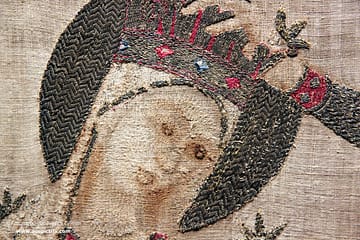 Opus ciprense - A large embroidered antependium in a museum display case