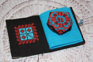 Fallahi embroidery - crossstitch patterns used on a needlebook and a pincushion