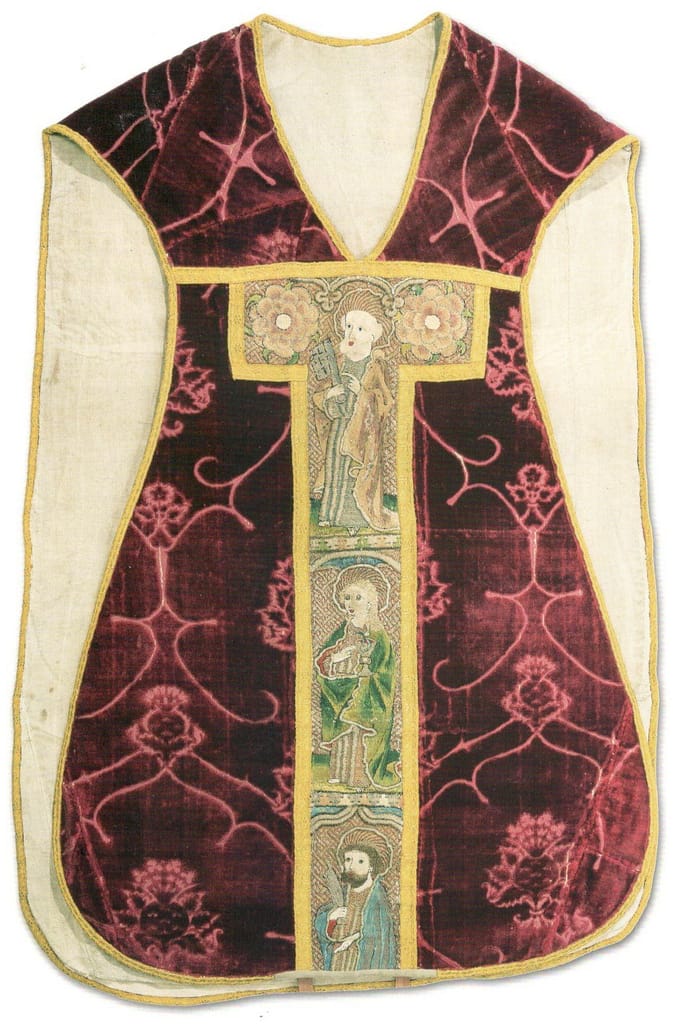 Medieval goldwork - multicoloured embroidered cross on a red chasuble