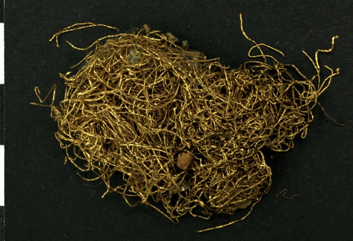 Gold threads - a chaotic bunch of gold threads parts