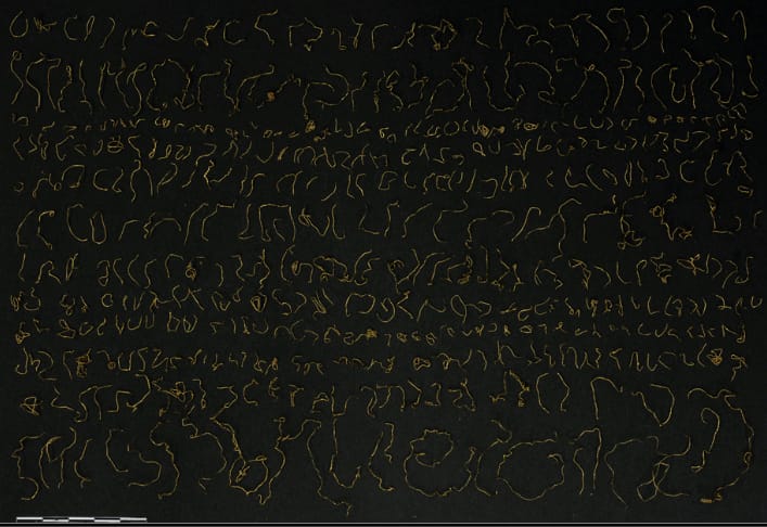 Gold threads -sorted gold threads parts on a black background