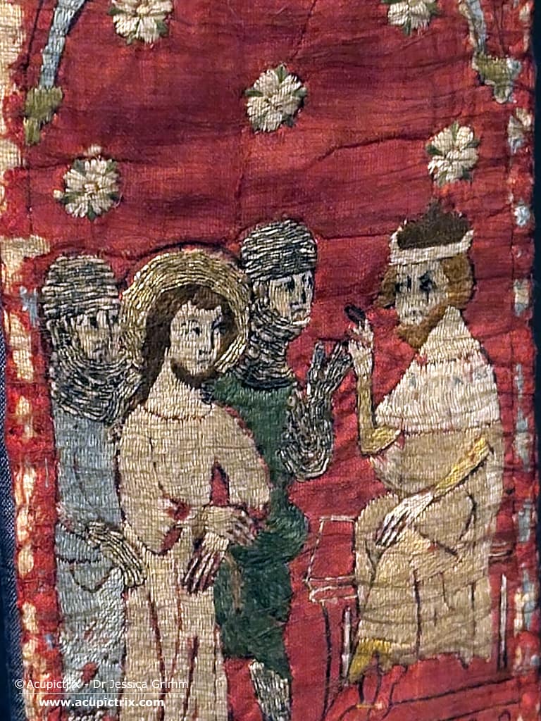 Stiftsmuseum Xanten - a red maniple embroidered with scenes of the Passion