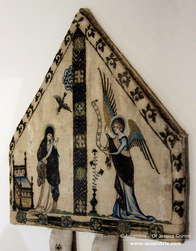 Jean le Noir - Embroidered mitre on display in the museum.