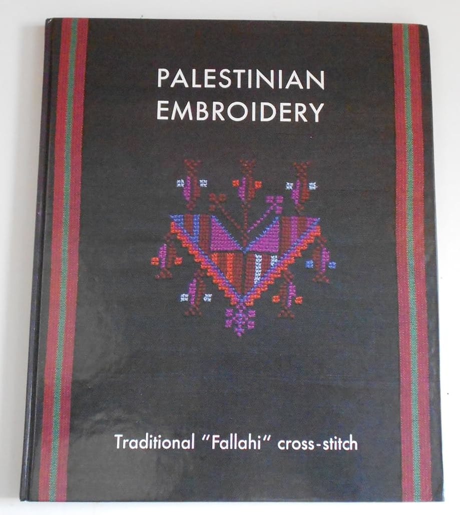Fallahi Embroidery - black book cover with colourful crossstitch embroidery